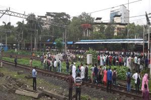 Central Railway services affected after man climbs electric mast